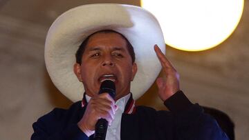 Leftist school teacher Pedro Castillo speaks to supporters from the balcony of the Peru Libre party headquarters in Lima, following the official proclamation of him as Perux92s president-elect on July 19, 2021. - Leftist school teacher Pedro Castillo was proclaimed Peru&#039;s president-elect Monday, six weeks after a polarizing vote of which the results were delayed by claims of electoral fraud from his right-wing rival, Keiko Fujimori. (Photo by Gian MASKO / AFP)