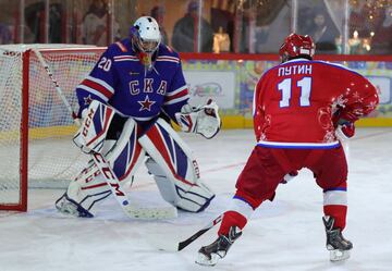 Vladimir Putin took part in the traditional Christmas day ice hockey exhibition match in Red Square and led his side to victory, scoring eight times in an 8-5 victory, according to the Associated Press and Reuters, although the Kremlin match report credit