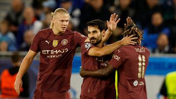 Soccer Football - Champions League - Slovan Bratislava v Manchester City - Tehelne pole, Bratislava, Slovakia - October 1, 2024 Manchester City's Ilkay Gundogan celebrates scoring their first goal with Erling Haaland and Jeremy Doku REUTERS/David W Cerny
