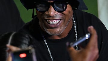 Brazilian former football player Ronaldinho smiles during the opening ceremony of the Legends Football Tournament Curacao in Willemstad on April 8, 2026. (Photo by Raul ARBOLEDA / AFP)