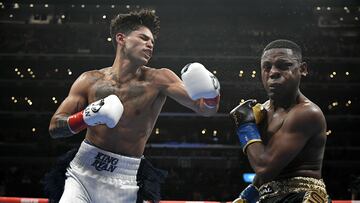 LOS ANGELES, CA - JULY 16: Ryan Garcia (white trunks) lands a punt on Javier Fortuna in the fourth round at the Crypto.com Arena on July 16, 2022 in Los Angeles, United States.   John McCoy/Getty Images/AFP
== FOR NEWSPAPERS, INTERNET, TELCOS & TELEVISION USE ONLY ==