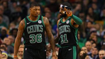 Marcus Smart y Kyrie Irving.