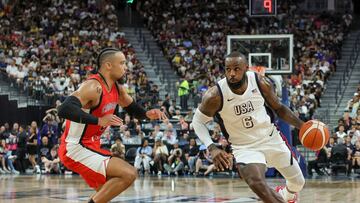 LAS VEGAS, NEVADA - JULY 10: LeBron James #6 of the United States drives against Dillon Brooks #24 of Canada in the second half of their exhibition game ahead of the Paris Olympic Games at T-Mobile Arena on July 10, 2024 in Las Vegas, Nevada. The United States defeated Canada 86-72. Ethan Miller/Getty Images/AFP (Photo by Ethan Miller / GETTY IMAGES NORTH AMERICA / Getty Images via AFP)