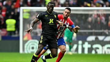 Almeria's Senegalese midfielder #06 Dion Lopy fights for the ball with Atletico Madrid's Spanish midfielder #06 Koke during the Spanish league football match between Club Atletico de Madrid and UD Almeria at the Metropolitano stadium in Madrid on December 10, 2023. (Photo by JAVIER SORIANO / AFP)