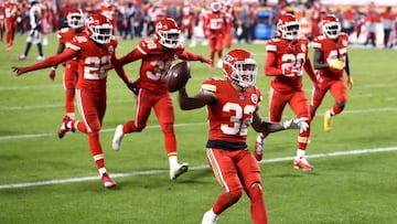 KANSAS CITY, MISSOURI - DECEMBER 06: Tyrann Mathieu #32 of the Kansas City Chiefs celebrates after an interception in the final minutes of a game against the Denver Broncos at Arrowhead Stadium on December 06, 2020 in Kansas City, Missouri. (Photo by Jami