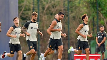 Portuguese forward Joao Felix (R) attends a training session with his new teammates following his official presentation as new player of FC Barcelona at the Joan Gamper training ground in Sant Joan Despi, near Barcelona, on September 2, 2023. Barcelona signed Atletico Madrid forward Joao Felix and Manchester City defender Joao Cancelo on loan until the end of the season, the Spanish champions. (Photo by Pau BARRENA / AFP)