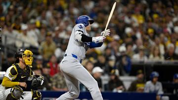 Oct 8, 2024; San Diego, California, USA; Los Angeles Dodgers designated hitter Shohei Ohtani (17) hits a single in the third inning against the San Diego Padres during game three of the NLDS for the 2024 MLB Playoffs at Petco Park.  Mandatory Credit: Denis Poroy-Imagn Images