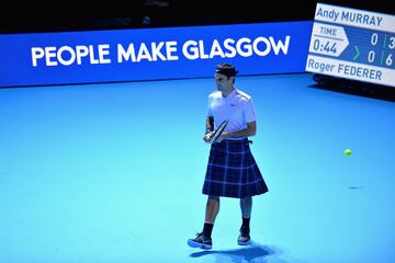 Andy Murray and Roger Federer play in charity match in Glasgow.