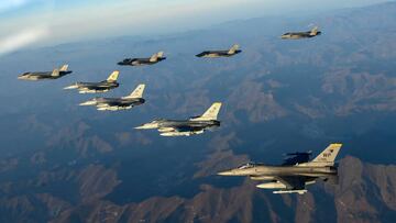 UNDISCLOSED LOCATION, SOUTH KOREA- NOVEMBER 18: In this handout image released by the South Korean Defense Ministry, South Korean Air Force F-35 fighter jets and U.S. Air Force F-16 fighter jets fly over South Korea during the joint air drills in response to North Korea's intercontinental ballistic missile (ICBM) launch on November 18, 2022 at an undisclosed location in South Korea. South Korea and the United States conducted a joint air drills Friday focusing on enhancing the capabilities of striking North Korea's missile-related facilities, hours after it fired ICBM. (Photo by South Korean Defense Ministry via Getty Images)