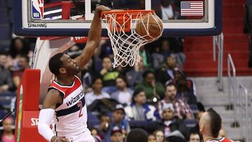 Dec 13, 2017; Washington, DC, USA; Washington Wizards guard John Wall (2) dunks the ball against the Memphis Grizzlies in the second quarter at Capital One Arena. Mandatory Credit: Geoff Burke-USA TODAY Sports