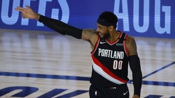 Aug 15, 2020; Lake Buena Vista, Florida, USA; Carmelo Anthony #00 of the Portland Trail Blazers celebrates a three point shot against the Memphis Grizzlies during the fourth quarter in the Western Conference play-in game one at The Field House. Mandatory