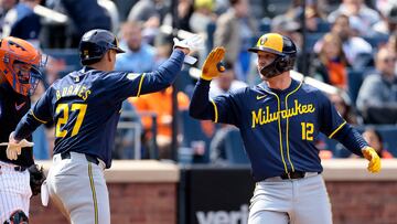 NEW YORK, NEW YORK - MARCH 30: Rhys Hoskins #12 of the Milwaukee Brewers is congratulated by Willy Adames #12 after hitting a two run homerun in the top of the third inning against the New York Mets at Citi Field on March 30, 2024 in New York City.   Christopher Pasatieri/Getty Images/AFP (Photo by Christopher Pasatieri / GETTY IMAGES NORTH AMERICA / Getty Images via AFP)