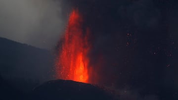 Lava rises at dawn following the eruption of a volcano in the Cumbre Vieja national park, in El Paso, on the Canary Island of La Palma, Spain September 24, 2021. REUTERS/Jon Nazca