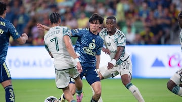 Ariel Lassiter (L) of Portland fights for the ball with Ralph Orquin (C) of America and Juan Mosquera (R) of Portland during the match between America and Portland Timbers as part of Phase One of the Leagues Cup 2025 at Q2 Stadium on August 06, 2025 in Austin, Texas, United States.