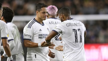 LOS ANGELES, CA - OCTOBER 20: Javier Hernandez #14 of Los Angeles Galaxy congratulates Samuel Grandsir #11 of Los Angeles Galaxy after he scored a goal agaist Los Angeles FC during the first half of the Western Conference Semifinals of 2022 MLS Cup playoffs at Banc of California Stadium on October 20, 2022 in Los Angeles, California.   Kevork Djansezian/Getty Images/AFP