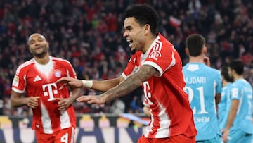 Bayern Munich's Colombian forward #14 Luis Diaz (R) celebrates scoring the 4-1 during the German first division Bundesliga football match between FC Bayern Munich and TSG 1899 Hoffenheim in Munich, southern Germany on February 8, 2026. (Photo by Alexandra BEIER / AFP) / DFL REGULATIONS PROHIBIT ANY USE OF PHOTOGRAPHS AS IMAGE SEQUENCES AND/OR QUASI-VIDEO