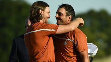 Europe&#039;s Italian golfer Francesco Molinari (R) and Europe&#039;s English golfer Tommy Fleetwood celebrate  after winning their foursomes match on the second day of the 42nd Ryder Cup at Le Golf National Course at Saint-Quentin-en-Yvelines, south-west