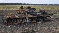 KUPIANSK, KHARKIV, UKRAINE - SEPTEMBER 17: Burnt military vehicles on the roadside after the city was regained from Russian forces, in Kupiansk, Kharkiv, Ukraine on September 17, 2022. (Photo by Metin Aktas/Anadolu Agency via Getty Images)