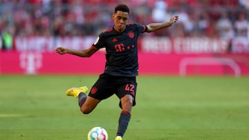 MUNICH, GERMANY - AUGUST 14: Jamal Musiala of Muenchen runs with the ball during the Bundesliga match between FC Bayern München and VfL Wolfsburg at Allianz Arena on August 14, 2022 in Munich, Germany. (Photo by Lars Baron/Getty Images)