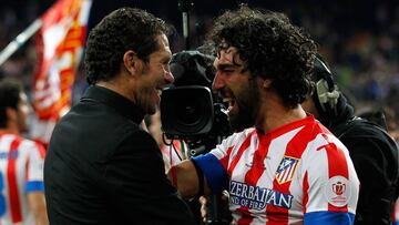 Simeone y Arda Turan.