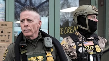 FILE PHOTO: Border Patrol commander Greg Bovino looks on as he and his convoy stop at a gas station, days after an ICE agent fatally shot Renee Nicole Good in Minneapolis, in Columbia Heights, Minnesota, U.S., January 13, 2026. REUTERS/Tim Evans/File Photo