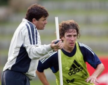 Puyol con Jos¨¦ Antonio Camacho.