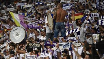 A Real Madrid&#039;s fan plays with a drum during the UEFA Champions League football match Real Madrid CF vs APOEL FC at the Santiago Bernabeu stadium in Madrid on September 13, 2017. 