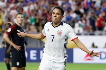 Carlos Bacca #7 of Colombia celebrates his first half goal