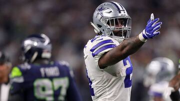 ARLINGTON, TEXAS - JANUARY 05: Ezekiel Elliott #21 of the Dallas Cowboys gestures for a first down against the Seattle Seahawks in the fourth quarter during the Wild Card Round at AT&amp;T Stadium on January 05, 2019 in Arlington, Texas.   Tom Pennington/Getty Images/AFP
 == FOR NEWSPAPERS, INTERNET, TELCOS &amp; TELEVISION USE ONLY ==