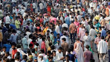 Daily wage migrant labourers gather alongside a road as they wait for work, amidst the coronavirus disease (COVID-19) outbreak, in Ahmedabad, India, September 10, 2020. REUTERS/Amit Dave