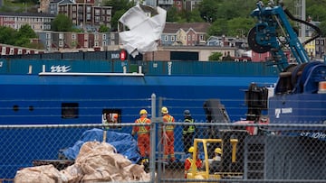 Debris from the Titan submersible, recovered from the ocean floor near the wreck of the Titanic, is unloaded from the ship Horizon Arctic at the Canadian Coast Guard pier in St. John's, Newfoundland on Wednesday, June 28, 2023. (Paul Daly/The Canadian Press via AP)