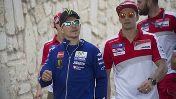 AUSTIN, TEXAS - APRIL 08: Jorge Lorenzo of Spain and Movistar Yamaha MotoGP and Andrea Iannone of Italy and Ducati Team (R) arrive at the autographs session for fans during the MotoGp Red Bull U.S. Grand Prix of The Americas - Free Practice at Circuit of The Americas on April 8, 2016 in Austin, Texas. (Photo by Mirco Lazzari gp/Bongarts/Getty Images)