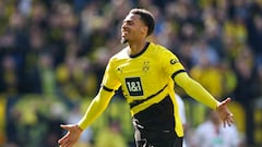 Why do Borussia Dortmund have two stars above the crest on their jersey?