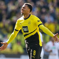 Why do Borussia Dortmund have two stars above the crest on their jersey?