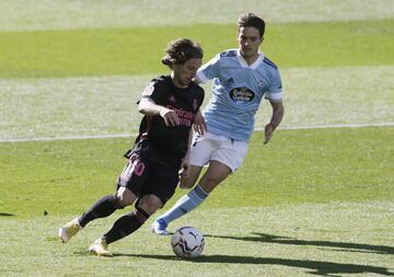Luka Modric y Denis Suárez. 