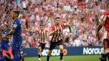 Athletic Bilbao's Spanish midfielder #08 Oihan Sancet celebrates scoring his team's first goal during the Spanish league football match between Athletic Club Bilbao and Getafe CF at the San Mames stadium in Bilbao on August 15, 2024. (Photo by ANDER GILLENEA / AFP)