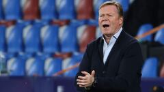 Barcelona&#039;s Dutch coach Ronald Koeman gestures during the Spanish league football match Levante UD against FC Barcelona at the Ciutat de Valencia stadium in Valencia on May 11, 2021. (Photo by JOSE JORDAN / AFP)