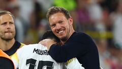 Soccer Football - Euro 2024 - Round of 16 - Germany v Denmark - Dortmund BVB Stadion, Dortmund, Germany - June 29, 2024 Germany coach Julian Nagelsmann celebrates with Jamal Musiala after the match REUTERS/Kai Pfaffenbach