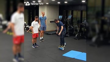 Tennis world no. 5 Alexander Zvrerv casually watched on as his conditioning coach proceeded attempt balancing on a foam roller, which did not go as planned.