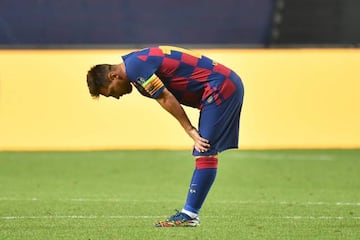 A dejected Lionel Messi looks at the ground during Barcelona's 8-2 defeat to Bayern Munich.