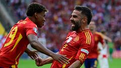 Spain's defender #02 Dani Carvajal celebrates with Spain's forward #19 Lamine Yamal after scoring his team's third goal during the UEFA Euro 2024 Group B football match between Spain and Croatia at the Olympiastadion in Berlin on June 15, 2024. (Photo by JOHN MACDOUGALL / AFP)