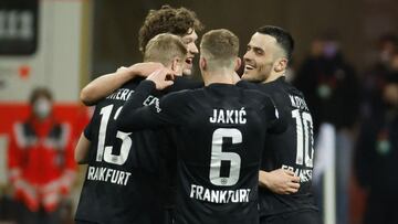 Soccer Football - Europa League - Round of 16 Second Leg - Eintracht Frankfurt v Real Betis - Deutsche Bank Park, Frankfurt, Germany - March 17, 2022 Eintracht Frankfurt's Martin Hinteregger celebrates scoring their first goal with teammates REUTERS/