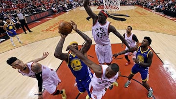 Jun 10, 2019; Toronto, Ontario, CAN; Golden State Warriors center DeMarcus Cousins (0) shoots the ball against Toronto Raptors center Serge Ibaka (9) in game five of the 2019 NBA Finals at Scotiabank Arena.