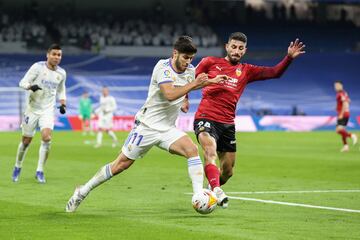 Marco Asensio y Cristiano Piccini.