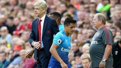 Wenger charged after confronting officials