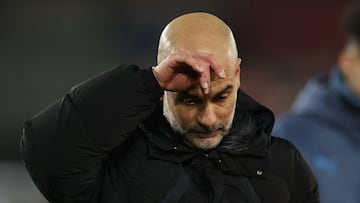 FILE PHOTO: Soccer Football - Premier League - Brentford v Manchester City - GTech Community Stadium, London, Britain - January 14, 2025 Manchester City manager Pep Guardiola looks dejected after the match REUTERS/Toby Melville EDITORIAL USE ONLY. NO USE WITH UNAUTHORIZED AUDIO, VIDEO, DATA, FIXTURE LISTS, CLUB/LEAGUE LOGOS OR 'LIVE' SERVICES. ONLINE IN-MATCH USE LIMITED TO 120 IMAGES, NO VIDEO EMULATION. NO USE IN BETTING, GAMES OR SINGLE CLUB/LEAGUE/PLAYER PUBLICATIONS. PLEASE CONTACT YOUR ACCOUNT REPRESENTATIVE FOR FURTHER DETAILS../File Photo