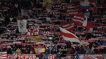 Atletico Madrid's supporters celebrate victory at the end of the UEFA Champions League group E football match between Club Atletico de Madrid and Lazio at the Metropolitano stadium in Madrid on December 13, 2023. Atletico won 2-0. (Photo by Thomas COEX / AFP)