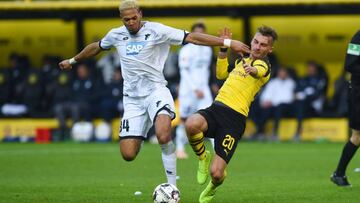 Dortmund&#039;s Danish forward Jacob Bruun Larsen and Hoffenheim&#039;s Brazilian forward Joelinton vie for the ball during the German first division Bundesliga football match Borussia Dortmund v Hoffenheim in Dortmund, western Germany, on February 9, 201