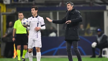 Real Sociedad's Spanish coach Imanol Alguacil (R) gestures during the UEFA Champions League 1st round day 6 Group D football match between Inter Milan and Real Sociedad at the San Siro stadium in Milan on December 12, 2023. (Photo by Marco BERTORELLO / AFP)