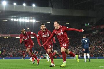 Xherdan Shaqiri wheels away after scoring against United